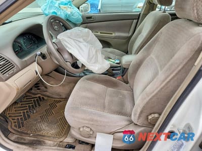 Zdjęcie 7 z 12 samochodu: 2002 TOYOTA CAMRY LE VIN:4T1BE32K02U069918 - miniatura