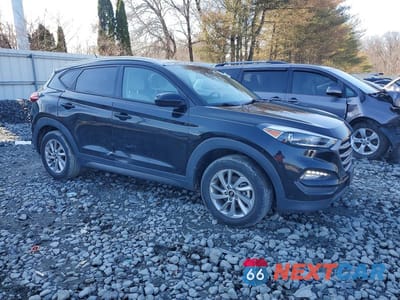 Czwarte zdjęcie samochodu z boku: 2016 HYUNDAI TUCSON SE VIN:KM8J3CA44GU114872 - miniatura