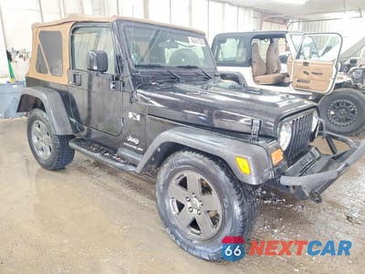 Czwarte zdjęcie samochodu z boku: 2006 JEEP WRANGLER X VIN:1J4FA39S06P744141 - miniatura