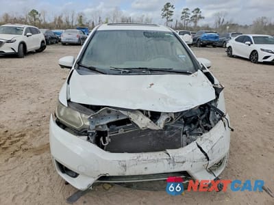 Piąte zdjęcie samochodu w środku: 2016 HONDA FIT EX VIN:JHMGK5H76GX017487 - miniatura