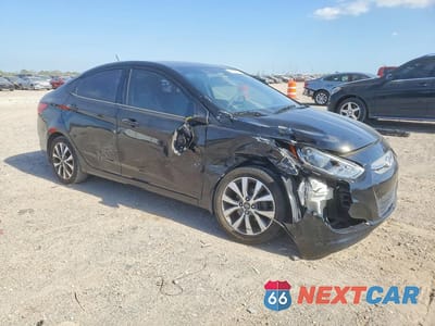 Czwarte zdjęcie samochodu z boku: 2017 HYUNDAI ACCENT VALUE EDITION VIN:KMHCT4AE3HU320774 - miniatura