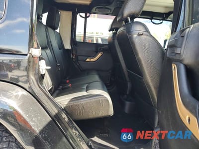 Zdjęcie 11 z 13 samochodu: 2014 JEEP WRANGLER UNLIMITED SAHARA VIN:1C4HJWEG7EL166515 - miniatura