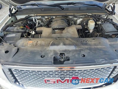 Zdjęcie 12 z 12 samochodu: 2015 GMC YUKON DENALI VIN:1GKS1CKJ4FR584182 - miniatura