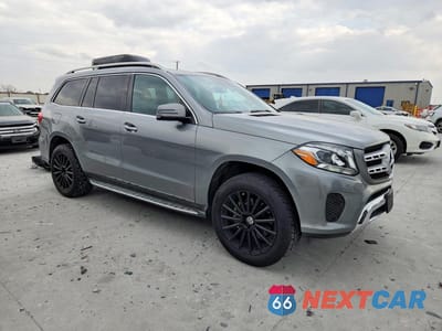Czwarte zdjęcie samochodu z boku: 2017 MERCEDES-BENZ GLS 450 4MATIC VIN:4JGDF6EE7HA779163 - miniatura