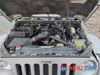 Zdjęcie 12 z 12 samochodu: 2008 JEEP WRANGLER SAHARA VIN:1J8FA54128L589692 - miniatura