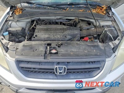 Zdjęcie 12 z 12 samochodu: 2004 HONDA PILOT EXL VIN:2HKYF18504H505813 - miniatura