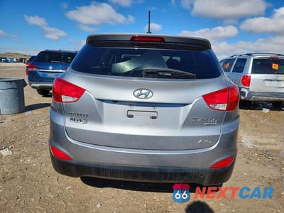 Zdjęcie 6 z 13 samochodu: 2013 HYUNDAI TUCSON LIMITED VIN:KM8JUCAC0DU623695 - miniatura