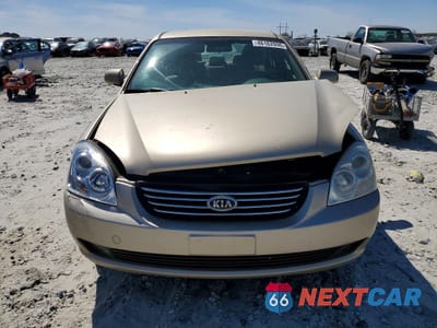 Piąte zdjęcie samochodu w środku: 2006 KIA OPTIMA LX VIN:KNAGE123465067190 - miniatura