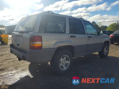 Trzecie zdjęcie samochodu z tyłu: 1997 JEEP GRAND CHEROKEE LAREDO VIN:1J4FX58SXVC540397 - miniatura