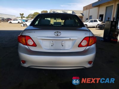 Zdjęcie 6 z 11 samochodu: 2010 TOYOTA COROLLA LE VIN:1NXBU4EE9AZ364500 - miniatura