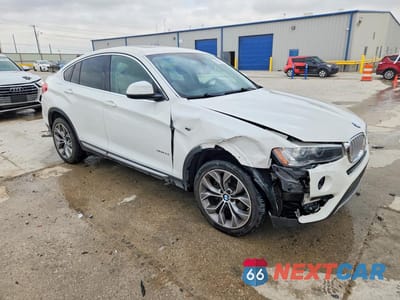 Czwarte zdjęcie samochodu z boku: 2015 BMW X4 XDRIVE35I VIN:5UXXW5C53F0E88887 - miniatura