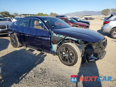 Czwarte zdjęcie samochodu z boku: 2024 BMW I4 EDRIVE 35 VIN:WBY43AW02RFR71838 - miniatura