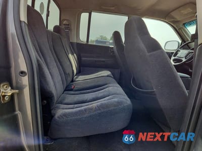 Zdjęcie 10 z 12 samochodu: 2004 DODGE DAKOTA QUAD SLT VIN:1D7HG48N84S758058 - miniatura