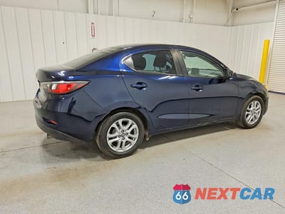 Trzecie zdjęcie samochodu z tyłu: 2017 TOYOTA YARIS IA BASE VIN:3MYDLBYV2HY162249 - miniatura
