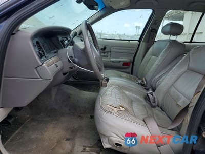 Zdjęcie 7 z 12 samochodu: 2000 FORD CROWN VICTORIA LX VIN:2FAFP74W6YX147875 - miniatura