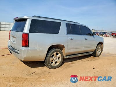 Trzecie zdjęcie samochodu z tyłu: 2015 CHEVROLET SUBURBAN C1500 LT VIN:1GNSCJKC9FR290067 - miniatura
