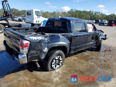 Trzecie zdjęcie samochodu z tyłu: 2022 TOYOTA TACOMA TRD OFF-ROAD VIN:3TMCZ5ANXNM503730 - miniatura