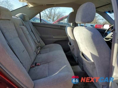 Zdjęcie 10 z 11 samochodu: 2004 TOYOTA CAMRY LE VIN:4T1BE32K34U310373 - miniatura