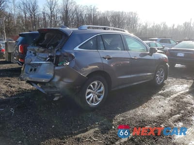 Trzecie zdjęcie samochodu z tyłu: 2017 ACURA RDX VIN:5J8TB4H34HL016873 - miniatura