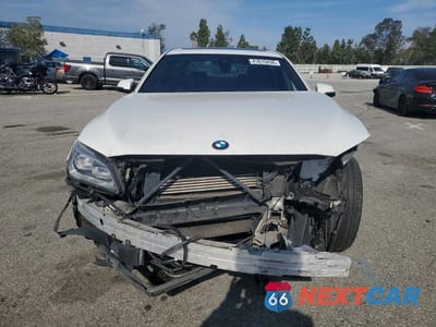 Piąte zdjęcie samochodu w środku: 2014 BMW 750 LXI VIN:WBAYF8C57ED652666 - miniatura