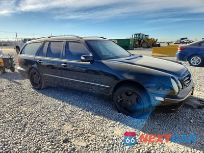 Czwarte zdjęcie samochodu z boku: 2001 MERCEDES-BENZ E 320 VIN:WDBJH65J21B284317 - miniatura