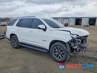 Czwarte zdjęcie samochodu z boku: 2022 CHEVROLET TAHOE K1500 Z71 VIN:1GNSKPKD0NR292318 - miniatura