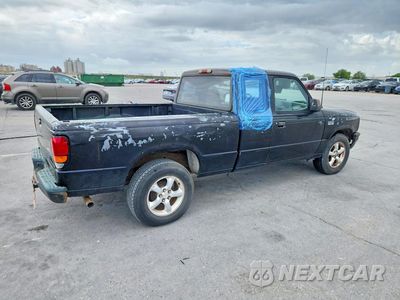 Piąte zdjęcie samochodu w środku: 1994 MAZDA B3000 CAB PLUS VIN:4F4CR16U1RTM03443 - miniatura