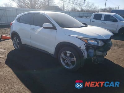 Czwarte zdjęcie samochodu z boku: 2017 HONDA HR-V LX VIN:3CZRU6H37HM700209 - miniatura