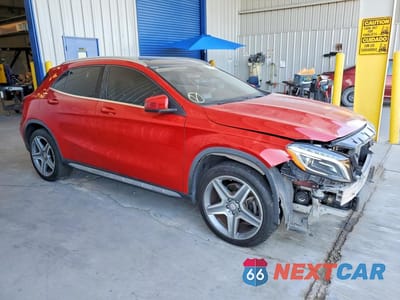 Czwarte zdjęcie samochodu z boku: 2015 MERCEDES-BENZ GLA 250 4MATIC VIN:WDCTG4GB7FJ039494 - miniatura