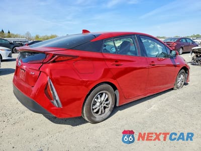 Trzecie zdjęcie samochodu z tyłu: 2022 TOYOTA PRIUS PRIME XLE VIN:JTDKAMFP1N3214180 - miniatura