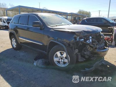 Czwarte zdjęcie samochodu z boku: 2013 JEEP GRAND CHEROKEE LAREDO VIN:1C4RJEAG0DC588001 - miniatura