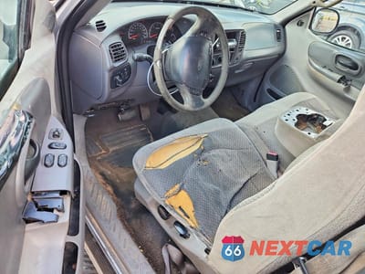 Zdjęcie 8 z 12 samochodu: 1999 FORD F150 VIN:1FTRX17L6XNB83989 - miniatura