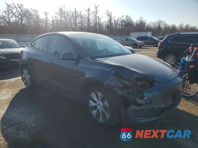 Czwarte zdjęcie samochodu z boku: 2021 TESLA MODEL Y VIN:5YJYGDEE7MF225307 - miniatura