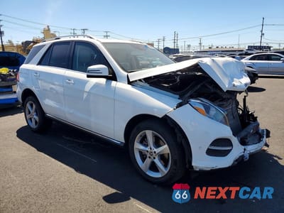Czwarte zdjęcie samochodu z boku: 2018 MERCEDES-BENZ GLE 350 VIN:4JGDA5JB6JB159652 - miniatura