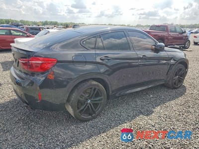 Trzecie zdjęcie samochodu z tyłu: 2019 BMW X6 M VIN:5YMKW8C52KLR38331 - miniatura