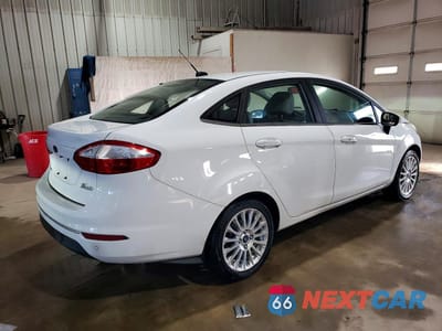 Trzecie zdjęcie samochodu z tyłu: 2015 FORD FIESTA TITANIUM VIN:3FADP4CJ3FM205445 - miniatura