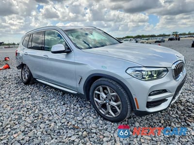 Czwarte zdjęcie samochodu z boku: 2021 BMW X3 SDRIVE30I VIN:5UXTY3C01M9F68361 - miniatura
