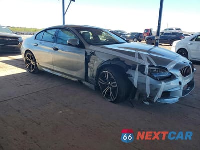 Czwarte zdjęcie samochodu z boku: 2015 BMW M6 GRAN COUPE VIN:WBS6C9C53FD467520 - miniatura