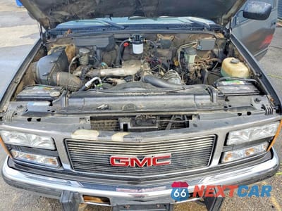 Zdjęcie 11 z 12 samochodu: 1992 GMC SIERRA C2500 VIN:1GTGC24F4NE526187 - miniatura