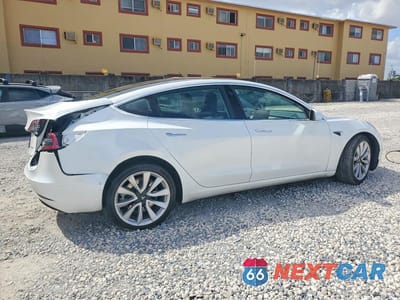 Trzecie zdjęcie samochodu z tyłu: 2019 TESLA MODEL 3 VIN:5YJ3E1EB9KF481532 - miniatura