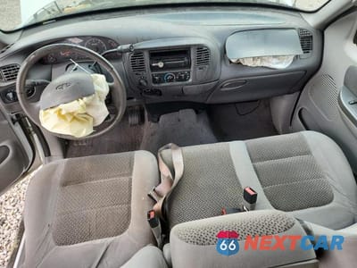 Zdjęcie 8 z 12 samochodu: 2002 FORD F150 SUPERCREW VIN:1FTRW08L12KD39197 - miniatura
