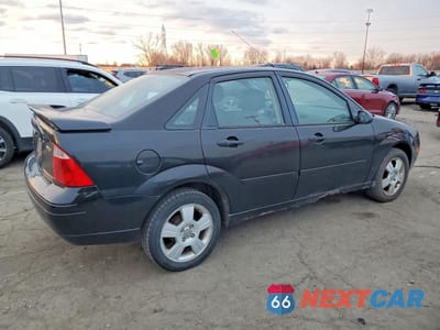 Trzecie zdjęcie samochodu z tyłu: 2006 FORD FOCUS ZX4 VIN:1FAHP34N56W135833 - miniatura