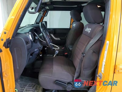 Zdjęcie 7 z 13 samochodu: 2012 JEEP WRANGLER UNLIMITED RUBICON VIN:1C4BJWFG3CL276852 - miniatura