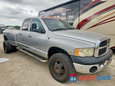 Czwarte zdjęcie samochodu z boku: 2004 DODGE RAM 3500 ST VIN:3D7MU48C44G264423 - miniatura