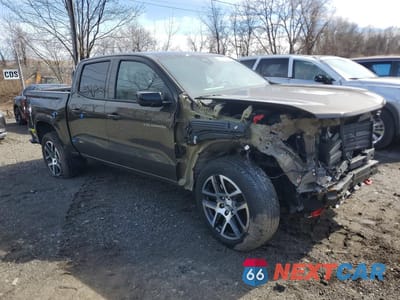 Czwarte zdjęcie samochodu z boku: 2024 CHEVROLET COLORADO Z71 4WD VIN:1GCPTDEKXR1157498 - miniatura