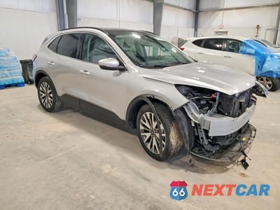 Czwarte zdjęcie samochodu z boku: 2020 FORD ESCAPE TITANIUM VIN:1FMCU9J93LUC39666 - miniatura