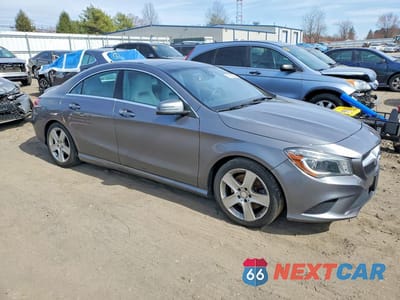 Czwarte zdjęcie samochodu z boku: 2015 MERCEDES-BENZ CLA 250 4MATIC VIN:WDDSJ4GB4FN219470 - miniatura