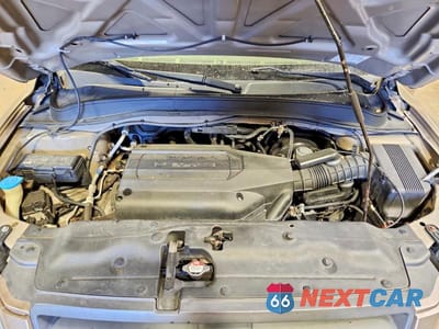 Zdjęcie 12 z 12 samochodu: 2004 HONDA PILOT EXL VIN:2HKYF185X4H525857 - miniatura