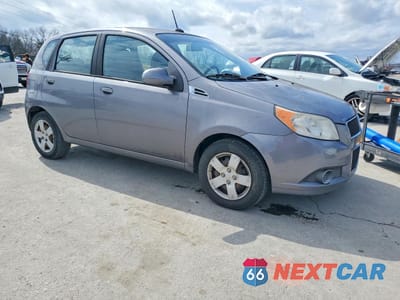 Czwarte zdjęcie samochodu z boku: 2011 CHEVROLET AVEO LS VIN:KL1TD6DE0BB206444 - miniatura