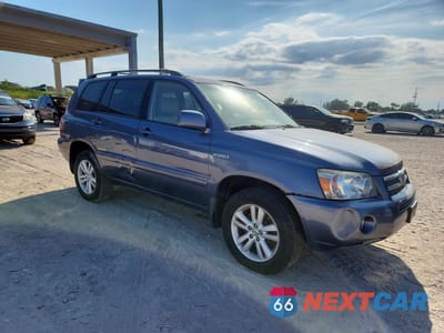 Czwarte zdjęcie samochodu z boku: 2006 TOYOTA HIGHLANDER HYBRID LIMITED VIN:JTEEW21A960021005 - miniatura